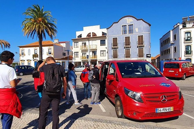 Aveiro and Costa Nova Half Day Tour from Porto with Boat Ride - Costa Nova beach stop: striped huts and the fastest photo sprint