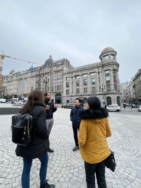 Discover Porto - A Private Walking Tour w/ Authentic Tasting - Porto Cathedral zone and Clérigos Tower, two silhouettes, two stories