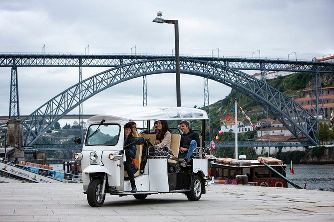 Discover Porto's Highlights on a 2-Hour Private Electric Tuk Tuk - Ponte do Infante to Sé do Porto: river engineering and church views