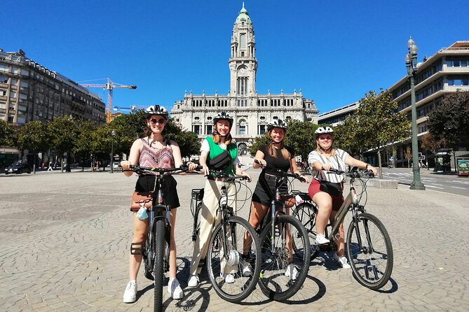 E Bike Porto Downtown and Sightseeing bike tour - Gliding beside clear water: the river and sea stretch