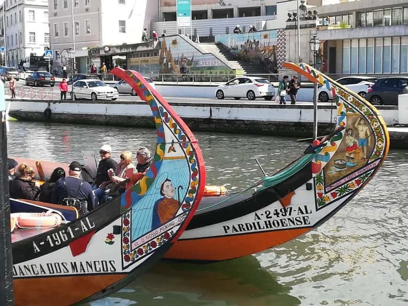 From Porto: Aveiro & Coimbra Tour with Moliceiro Boat Cruise - Salt pans and striped houses: what to watch for on the way to the waterline