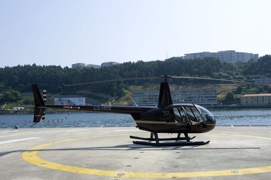 From Porto: City and Douro River Helicopter Sightseeing Tour - Porto’s UNESCO Historic Center from the air: red roofs and a hilltop view
