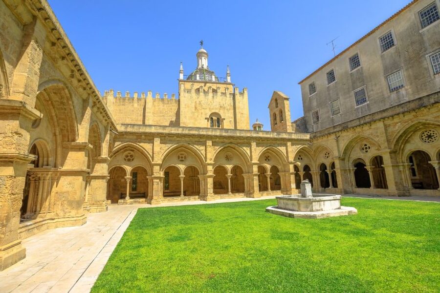 From Porto: Private Transfer to Lisbon with Coimbra & Fatima - Coimbra on the clock: University of Coimbra and the Joanina Library