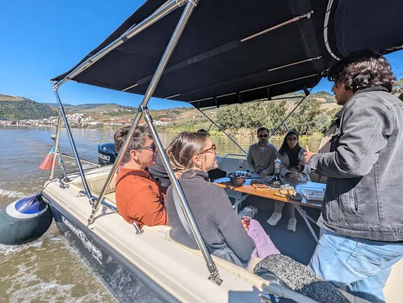 From Porto: Tastings at 2 Wineries, Chef's Lunch & Boat Tour - Meeting at Sá da Bandeira, then rolling into the Douro
