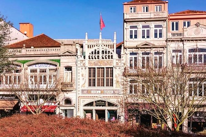 Half-day small group tour of Porto city with wine tasting - São Bento Station tiles, Livraria Lello, and Mercado do Bolhão