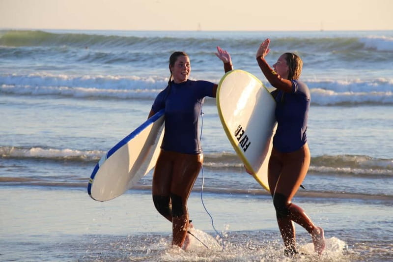 Matosinhos: Surfing Lesson with Equipment - Sand warm-up: standing, paddling, and learning how to fall