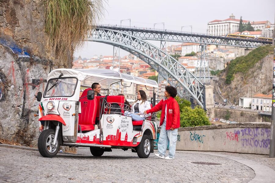 Oporto Tuk-Tuk Tour: Fast, Fun & Flexible – 1H to Full Day! - Crossing toward Serra do Pilar for the big skyline payoff