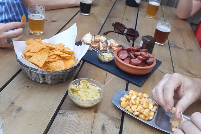 Porto: Craft Beer Tasting Tour with Local Snacks - What 10 beer tastings means for your palate (and your evening)