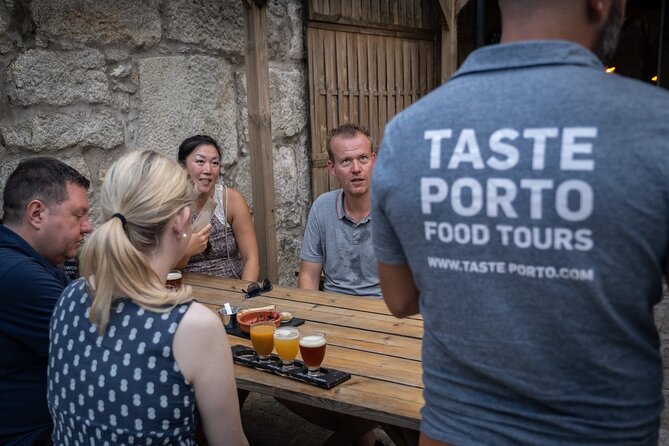 Porto Craft Beer Tour: 7 Beers + 3 Food Pairings in a Small Group - Stop 1 at Armazém da Cerveja, the Beer Warehouse Feeling
