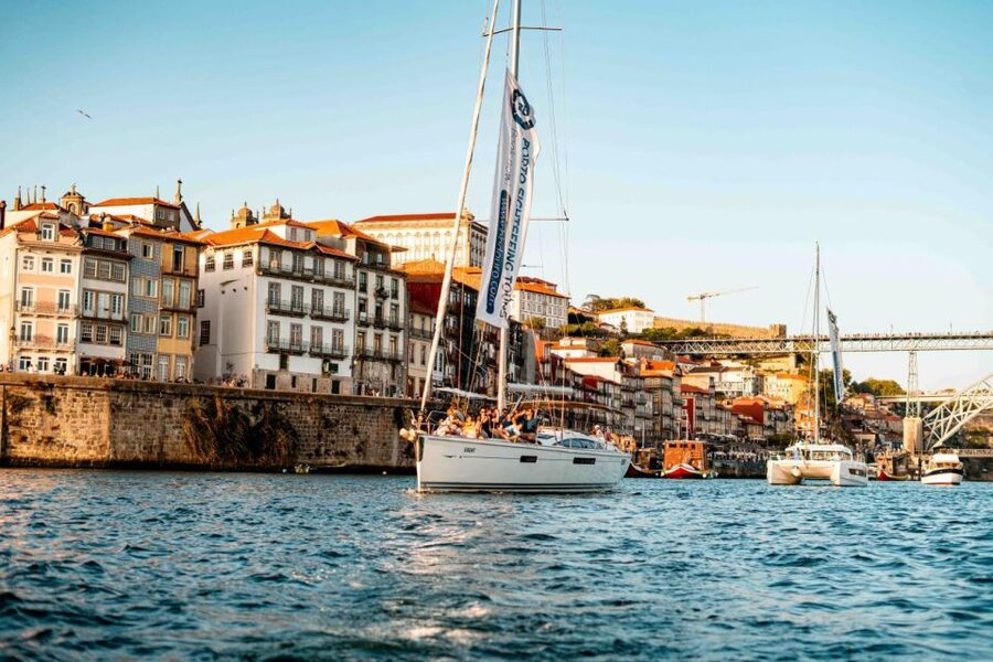 Porto: Daytime or Sunset Douro River Sightseeing Cruise - Passing Ponte Luis I and the rabelo boat world