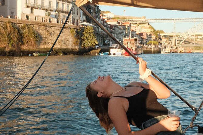 Porto: Douro River Boat Cruise with Port Wine and Snacks - Passing the oldest bridge, then the big iconic crossing