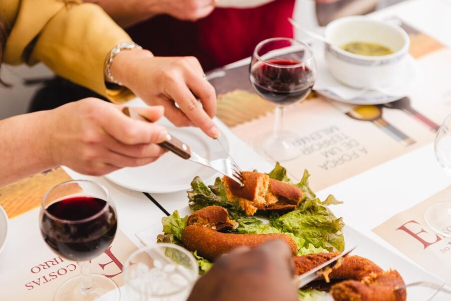 Porto: Food & Wine Tasting Walking Tour with Port Wine Cave - What you actually eat, from pastries to Bacalhau