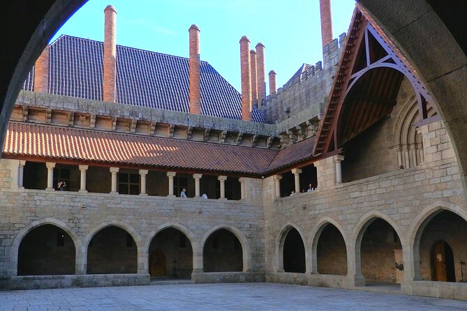 Porto: Guimaraes & Braga Small Group Tour with Lunch and Tickets - Guimarães Castle: walking the birthplace story