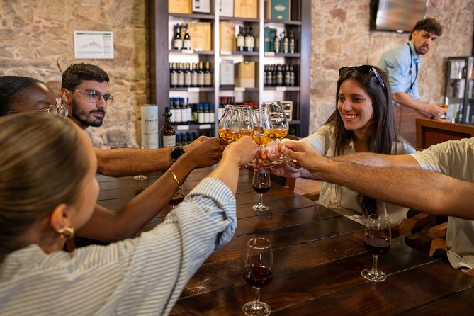 Porto Half-Day Guided Historical Tour with Port Cellar Visit and Tasting - Clérigos Church and Tower area: Baroque drama with a burial detail