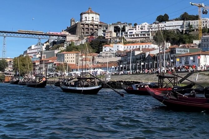 Porto:Passeio Barco no Rio Douro com Vinho do Porto e snacks 1-6 - The iconic bridge photo moment and what you learn about construction
