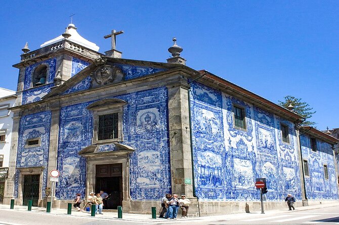 Porto private afternoon tour, discover the most iconic attractions - Batalha Square and the City Walls: Porto’s Old Meets New