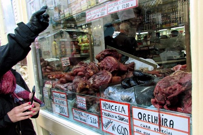 Porto Private Food & Wine Walking Tour with Market & Tastings - Rua das Flores: small tastings and Portuguese flavor logic