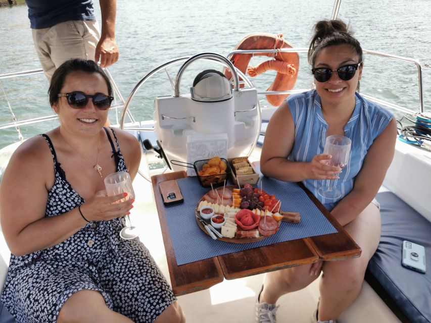 Porto: Private Sailboat Trip with Wine Tasting & Charcuterie - Passing Arrábida Bridge and Ponte D. Luiz I Like a Moving Postcard