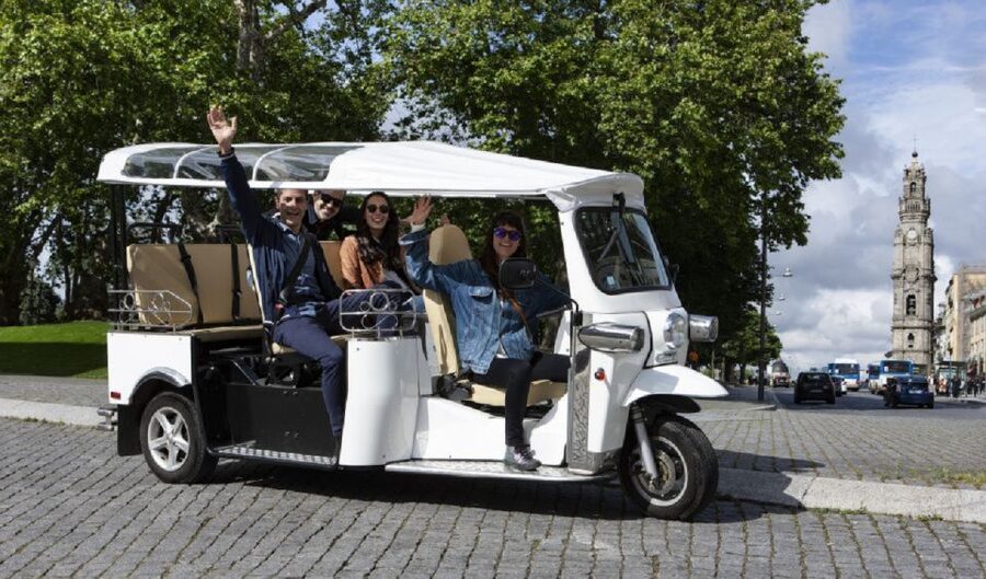 Porto: Private Sightseeing Tour by Electric Tuk Tuk - Ribeira district at UNESCO street level, not from a bus window