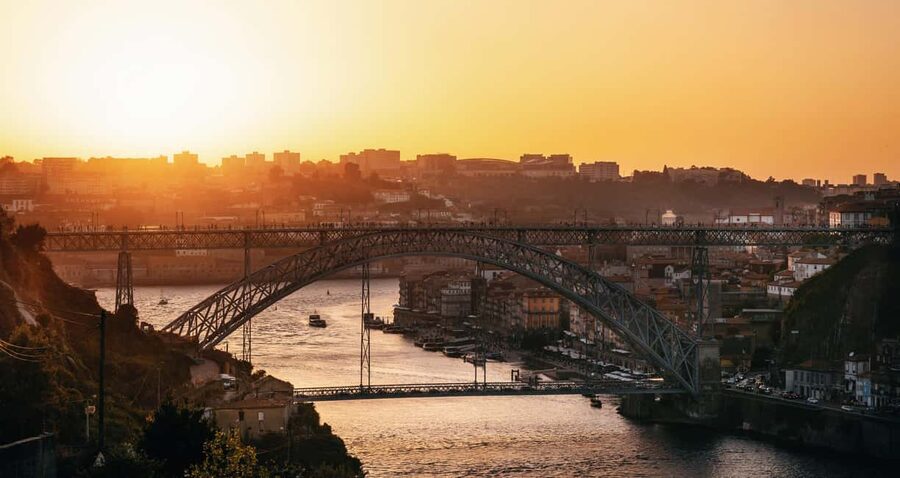 Porto: Private Sunset Walking Tour with Port Wine and Views - Starting at São Bento: tiles, Aliados Avenue, and the Carmo clue