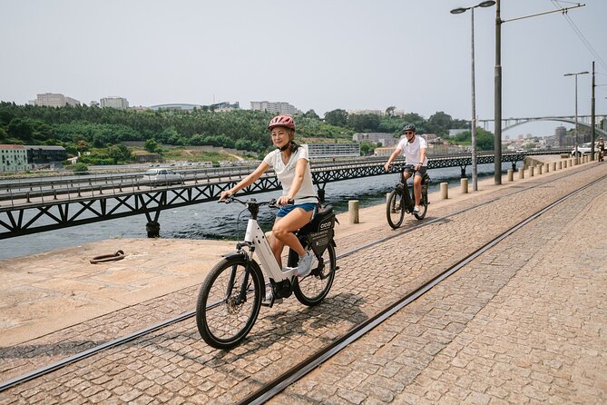 Porto Riverbank E-Bike Tour - Atlantic Coast, Gardens - From Cais de Gaia to Luís I Bridge: postcard Porto across the water