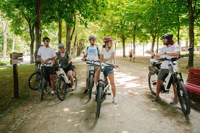 Porto Riverbank E-Bike Tour - Atlantic Coast, Gardens - Calém and the Tripeiro statue: discoveries energy in the middle of the ride