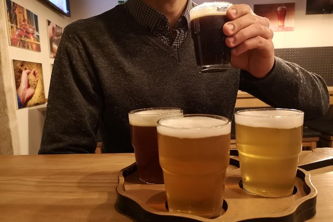 Porto Secrets, Craft Beer & Wine by Food Lover Tour - Where You Start at Praça de Carlos Alberto, and What the Evening Feels Like