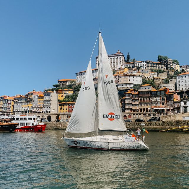 Porto: Shared Douro River Sunset Cruise with Welcome Drink - The Onboard Experience: Porto Wine, Spotify, and Real-World Guidance