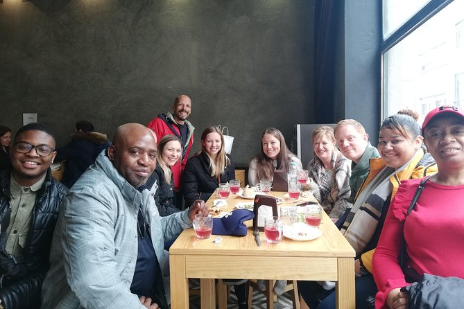 Porto Tapas and Vinho Verde Tour - Stop 1 at Porto Walkers: the market, pastries, and two classic taverns