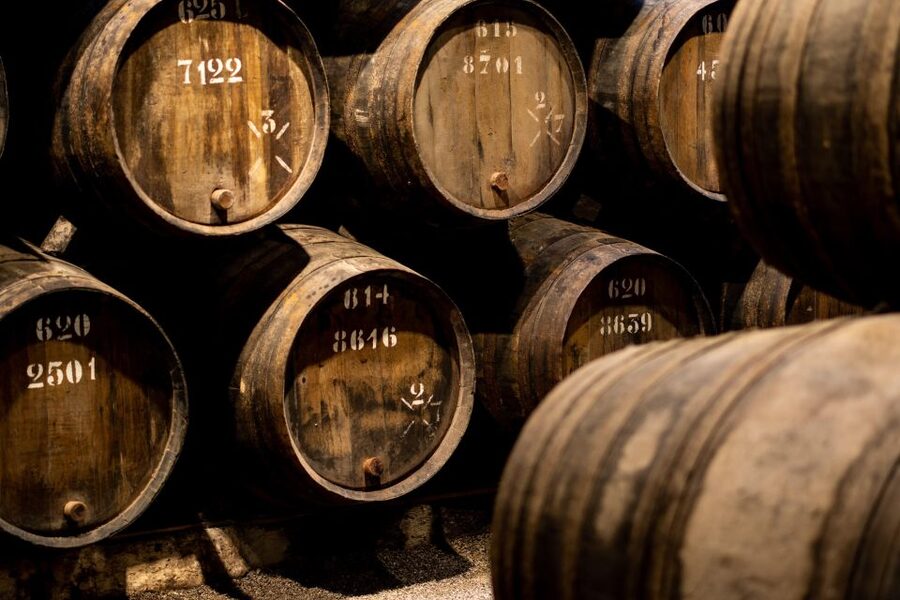 Porto: Taylor's Port Cellars & Tasting - Walking the self-guided route through 300-year old cellars