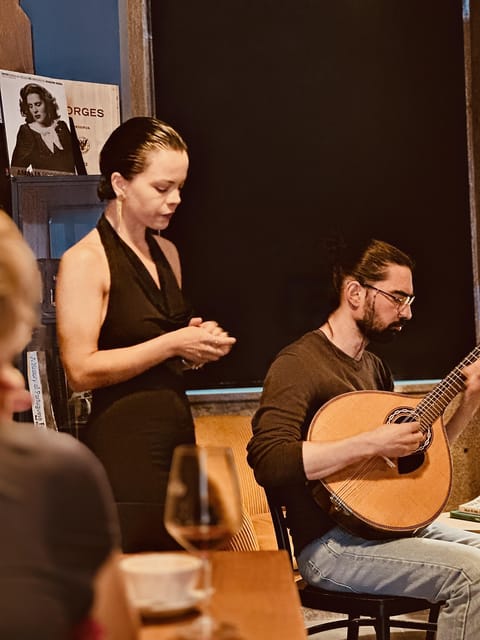 Porto: Traditional Fado Show with Welcome Drink - Music setup: guitarra portuguesa, classical guitar, and close harmony