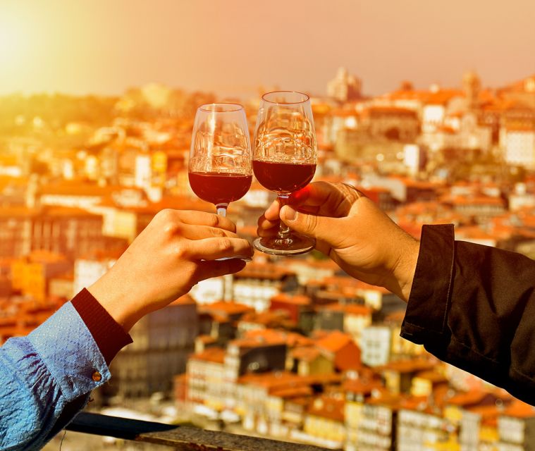 Porto: Tuk Tuk Sunset Tour with Glass of Port Wine - Largo Actor Dias start, electric tuk tuk comfort, and what to bring