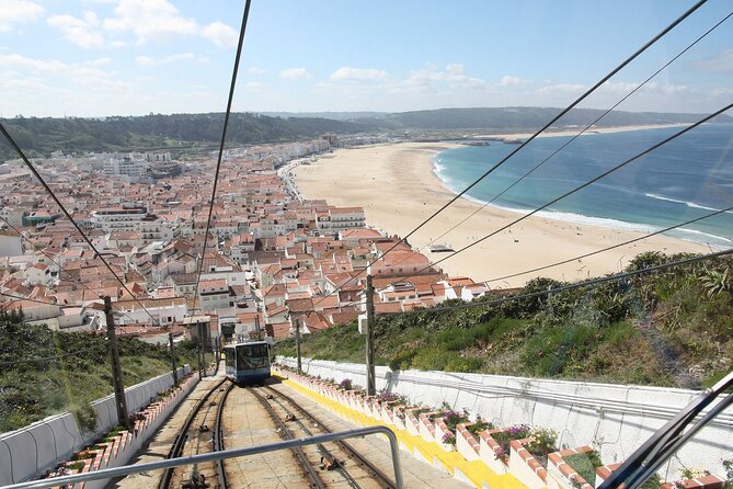 Private Tour to Nazaré and Alcobaça, giant waves and a monastery - Leaving Porto in a luxury van, not a scramble