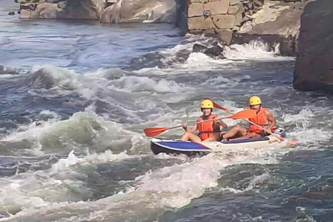 Rafting Experience on the Minho River with Coraltours Minho - On the river: rapids, rock jumps, and that safety plus fun mix