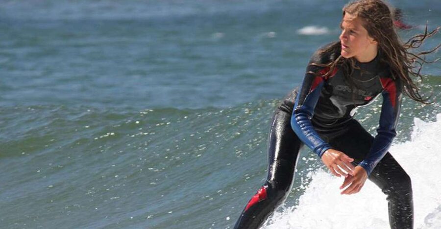 Self-Guided Bike to Surf"N"Food Pack - Surf session handoff: gear, instructor, and time in the water