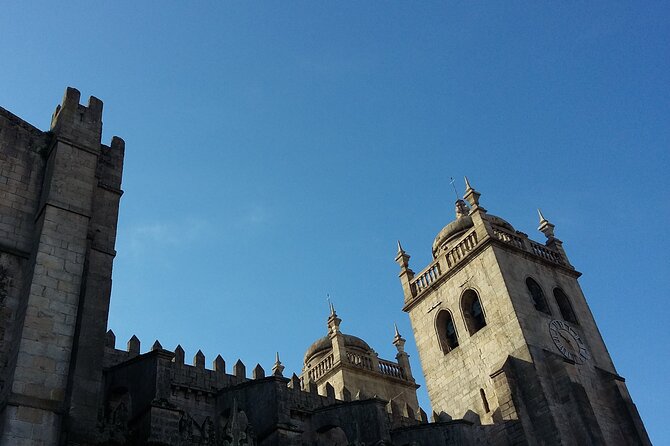 Small-group Porto's Roots Walking Tour - Stop 2: Cais da Ribeira, old streets, trade, wine, and bridges