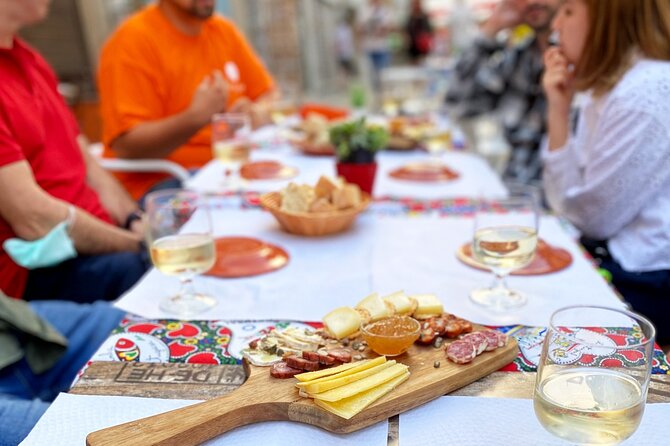 Wine Tasting with Tapas Walking Tour in Porto - Wine Chalet Portugal: Vinho Verde, Douro Valley wines, and petiscos